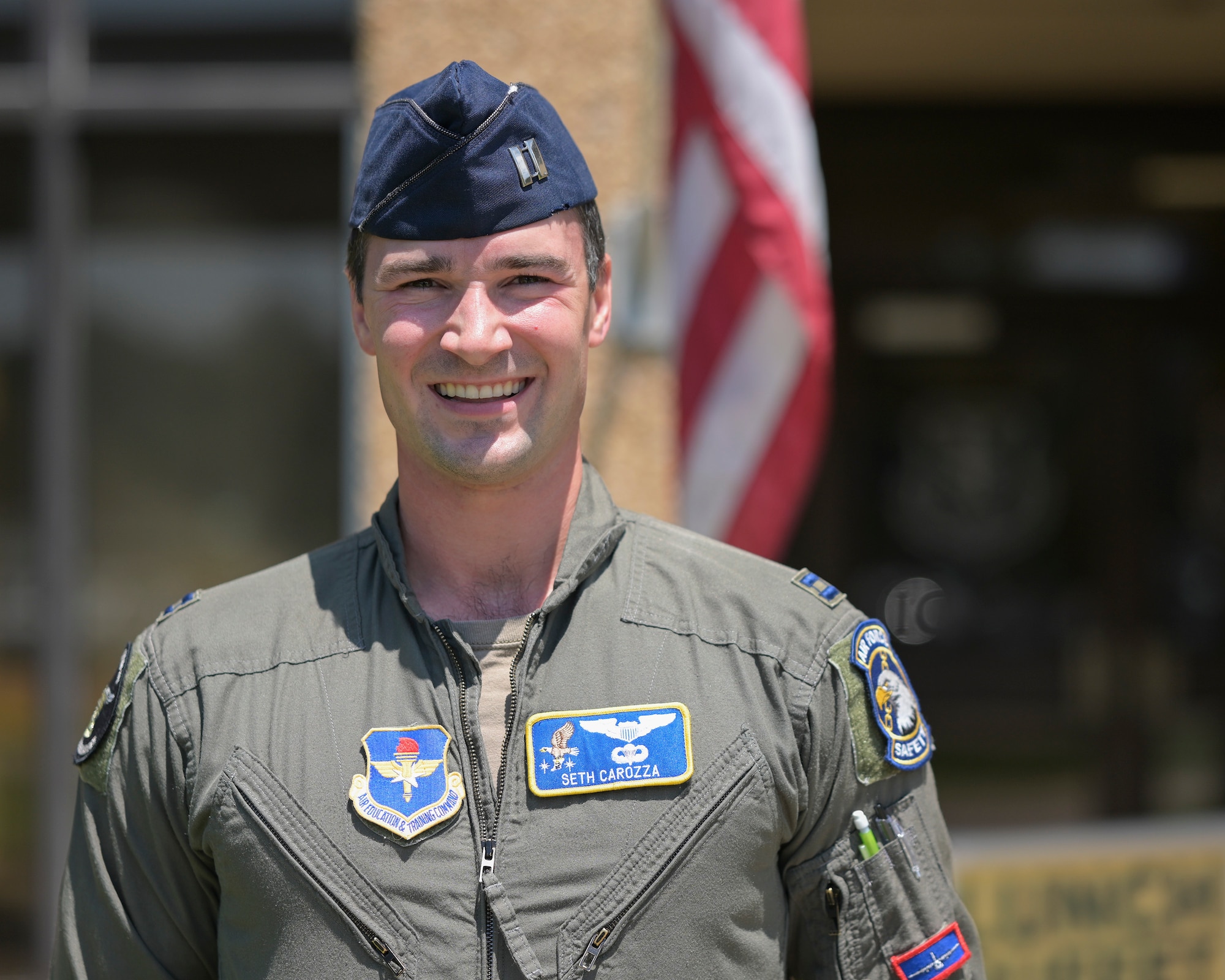 Capt. Seth Carozza poses for a photo outside of the 14th Operations Group building.