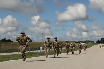 Illinois Army National Guard Soldiers run in the TAG 25 competition, Aug. 21, 2025.
