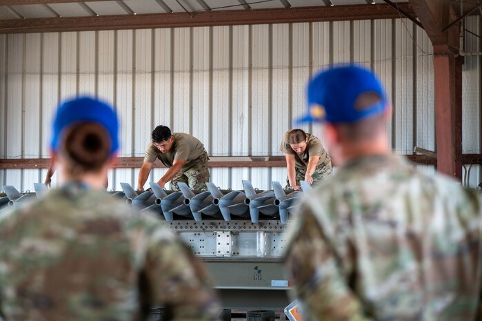 U.S. Air Force Airmen assigned to the 49th Munitions Squadron participate in Operation Eradicator as part of the Air Force Combat Operations Competition (AFCOCOMP) at Beale Air Force Base, California, Aug. 14, 2025.
