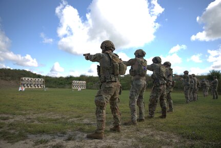 Illinois Army National Guard Soldiers compete in the TAG team pistol event at Marseilles Training Center, Aug. 21, 2025.