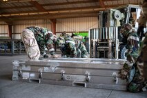 U.S. Air Force Airmen assigned to the 48th Munitions Squadron participate in Operation Exterminator as part of the Air Force Combat Operations Competition (AFCOCOMP) at Beale Air Force Base, California, Aug. 15, 2025.