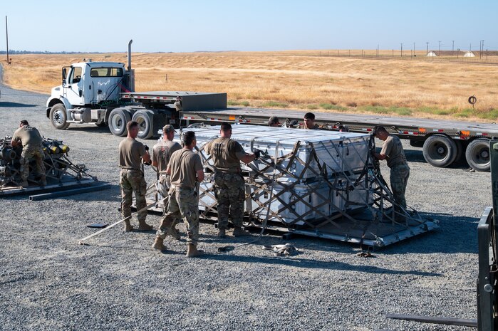 U.S. Air Force Airmen assigned to the 5th Munitions Squadron participate in Operation Tomahawk as part of the Air Force Combat Operations Competition (AFCOCOMP) at Beale Air Force Base, California, Aug. 15, 2025.