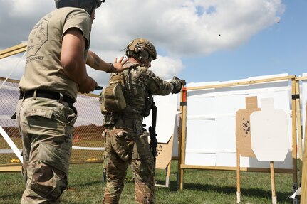 Illinois Army National Guard Soldiers fire pistols during the TAG 25 competition at Marseilles Training Center, Aug. 21, 2025.