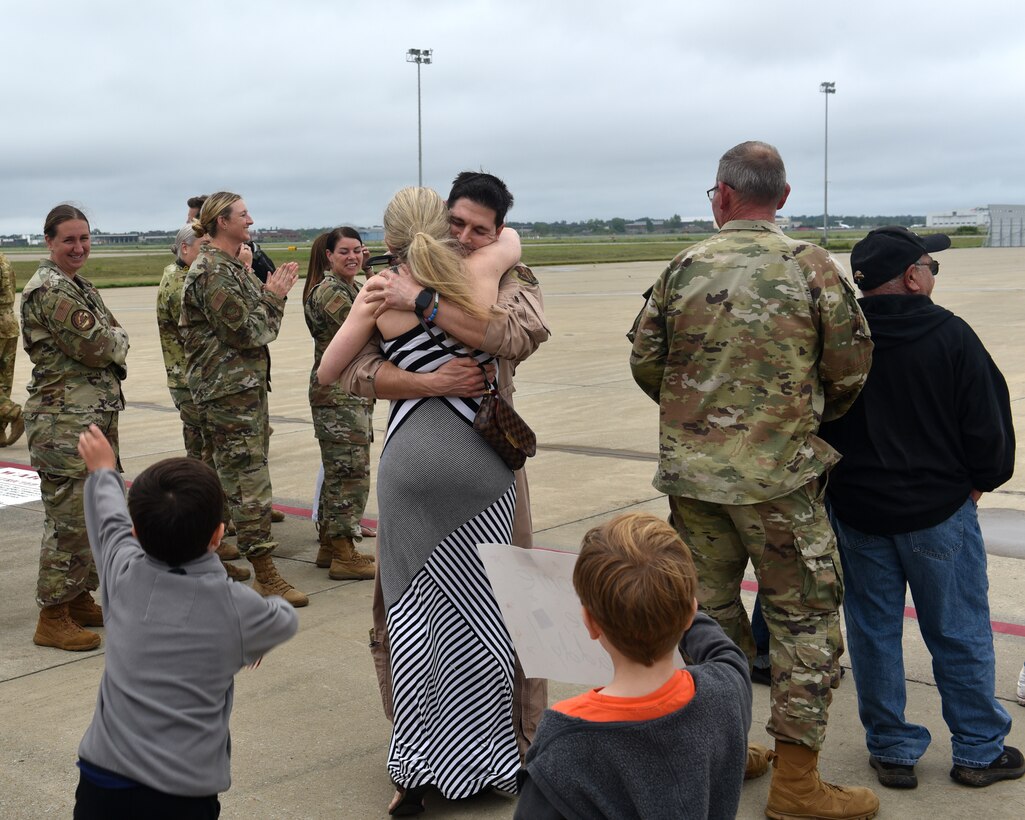 Friends and family welcome home members of the 914th Air Refueling Wing, Aug. 20, 2025, at the Niagara Falls Air Reserve Station, New York, following a four-month deployment overseas supporting global operations.