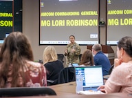 Maj. Gen. Lori Robinson, commanding general of the U.S. Army Aviation and Missile Command, provided opening remarks at the third annual Data Analytics Day, Aug. 20 in the Sparkman Center on Redstone Arsenal, Ala. The daylong event stresses the importance of data and the tools available to process it.