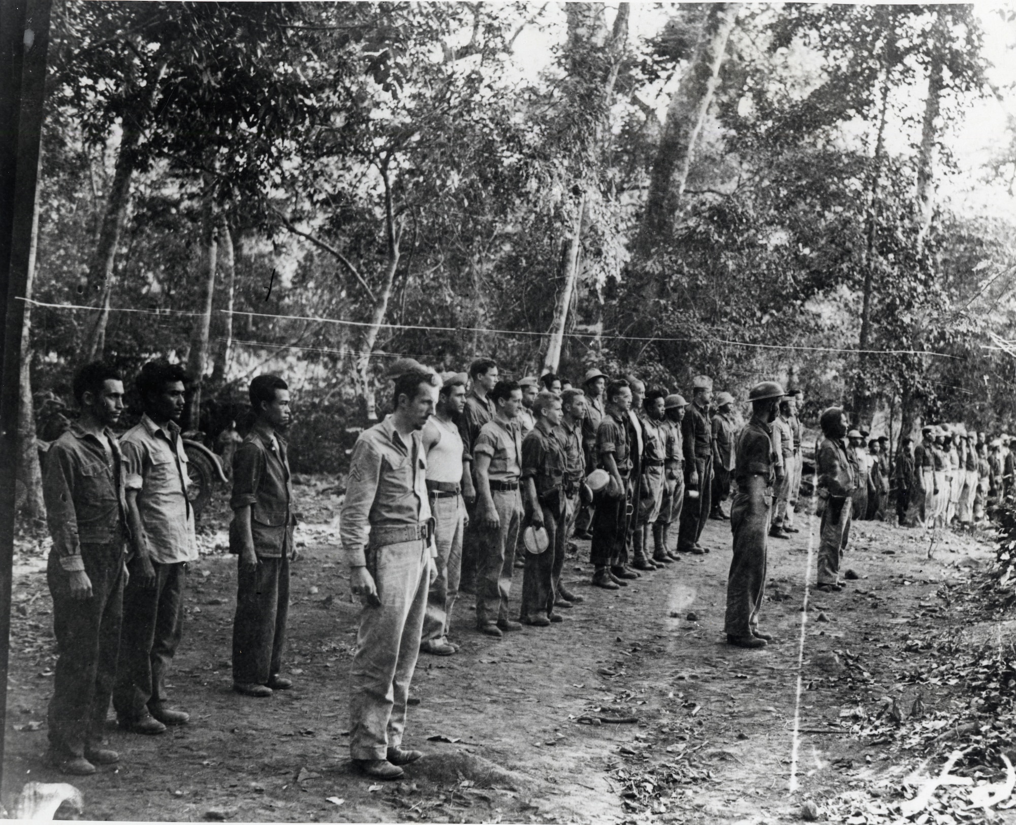 USAFFE units at the Signal Corps base camp "Mudhole" on Bataan on January 10, 1942. Established in July 1941, USAFFE, included the military forces of the Philippine Commonwealth, the Philippine Scouts, and the US Army.