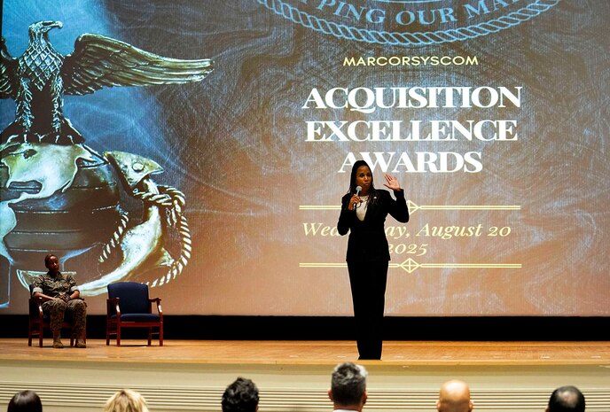 Sgt. Maj. Robin Fortner, retired, spoke at the Acquisition Excellence Awards about the importance of teamwork within the acquisition workforce for the Marine warfighter at Marine Base Quantico, Va., Aug. 20, 2025.