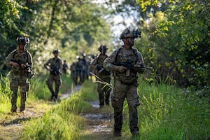 U.S. Air Force Airmen assigned to the 820th Base Defense Group conduct a patrol operation at Moody Air Force Base, Georgia, Aug. 5, 2025. The patrol was part of a 72-hour capstone event designed to sharpen Airmen’s operational readiness in support of base defense. (U.S. Air Force photo by Senior Airman Leonid Soubbotine)