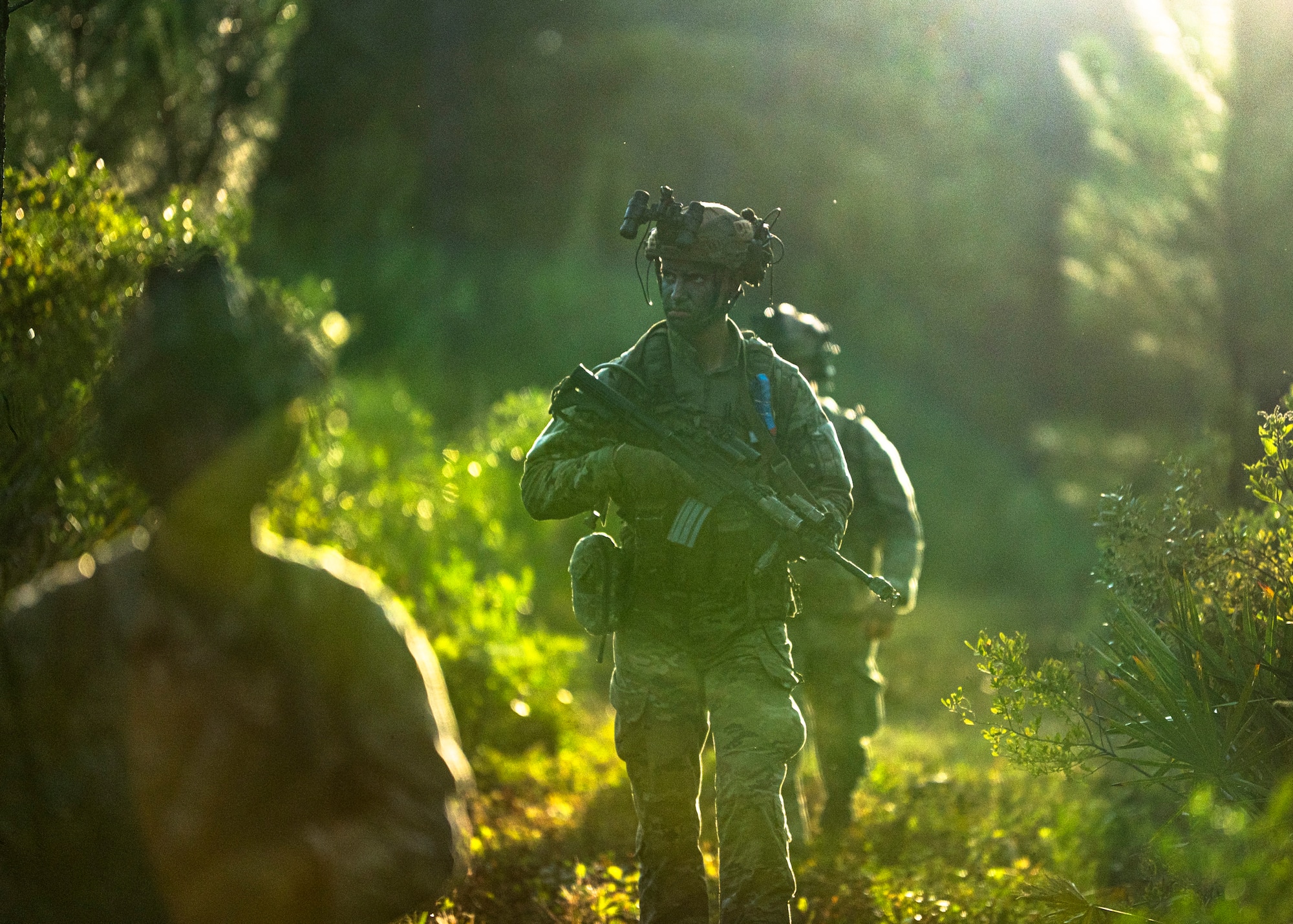 U.S. Air Force Airmen assigned to the 820th Base Defense Group conduct patrol operations at Moody Air Force Base, Georgia, Aug. 5, 2025. The patrol enabled Airmen to exercise teamwork, navigation and combat skills in austere conditions. (U.S. Air Force photo by Senior Airman Leonid Soubbotine)