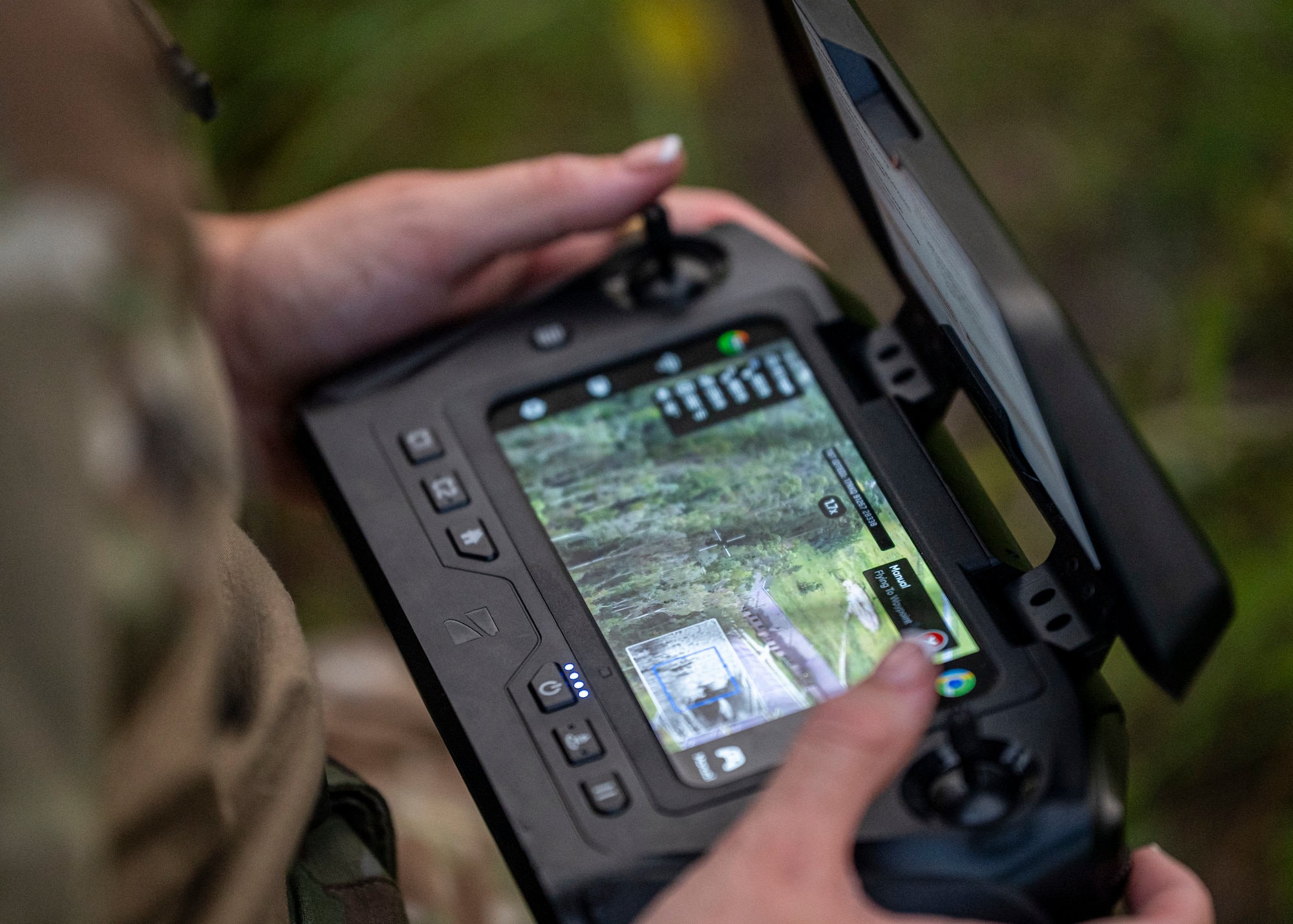 A U.S. Air Force Airman assigned to the 820th Base Defense Group operates a drone at Moody Air Force Base, Georgia, Aug. 5, 2025. The integration of drones allows for real-time surveillance and intelligence gathering, improving mission efficiency and effectiveness. (U.S. Air Force photo by Senior Airman Leonid Soubbotine)