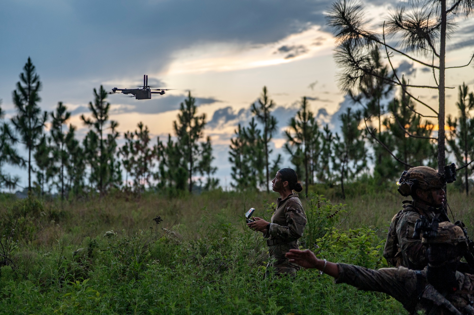 A U.S. Air Force Airman assigned to the 820th Base Defense Group flies a drone at Moody Air Force Base, Georgia, Aug. 5, 2025. As part of the Mission Qualification Training course, Airmen used drones to practice reconnaissance and enhance situational awareness. (U.S. Air Force photo by Senior Airman Leonid Soubbotine)