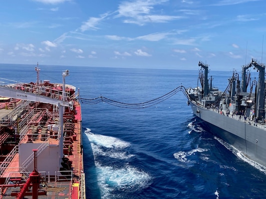 Japan Maritime Self-Defense Force Mashū-class replenishment ship JS Ōmi (AOE-426) connects to Military Sealift Command’s commercial charter motor tanker Stena Imperative during a consolidated cargo replenishment at sea west of Kyushu, Japan, Aug. 15, 2025.