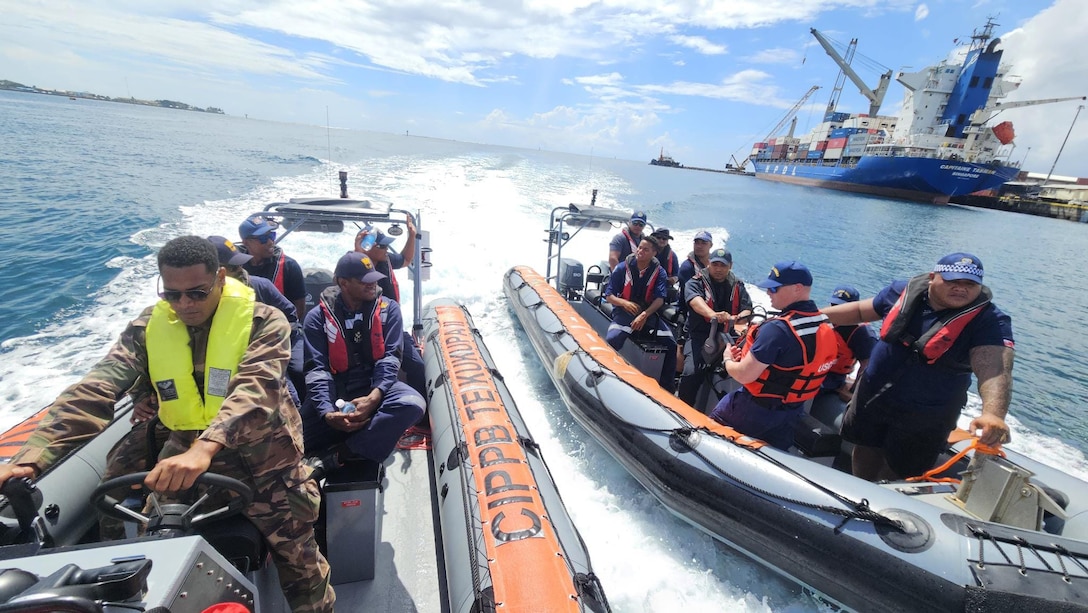 Boats crews comprising Samoan Police Maritime Wing officers, U.S. Coast Guard Mobile Training Team members, and Operation Ika Moana participants conduct training offshore Apia, Samoa, Aug. 12, 2025. During Operation Ika Moana, patrol boat crews from six Pacific Island nations participated in underway training focused on boarding team and search and rescue techniques. (U.S. Coast Guard photo)