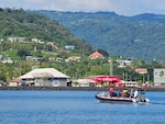 Operation Ika Moana participants approach Samoa Police Headquarters in Apia, Samoa, Aug. 12, 2025. The Samoan Police Maritime Wing hosted Operation Ika Moana, a collaborative maritime surveillance initiative intended to combat illegal, unreported, and unregulated fishing and transnational crimes across Oceania. (U.S. Coast Guard photo)
