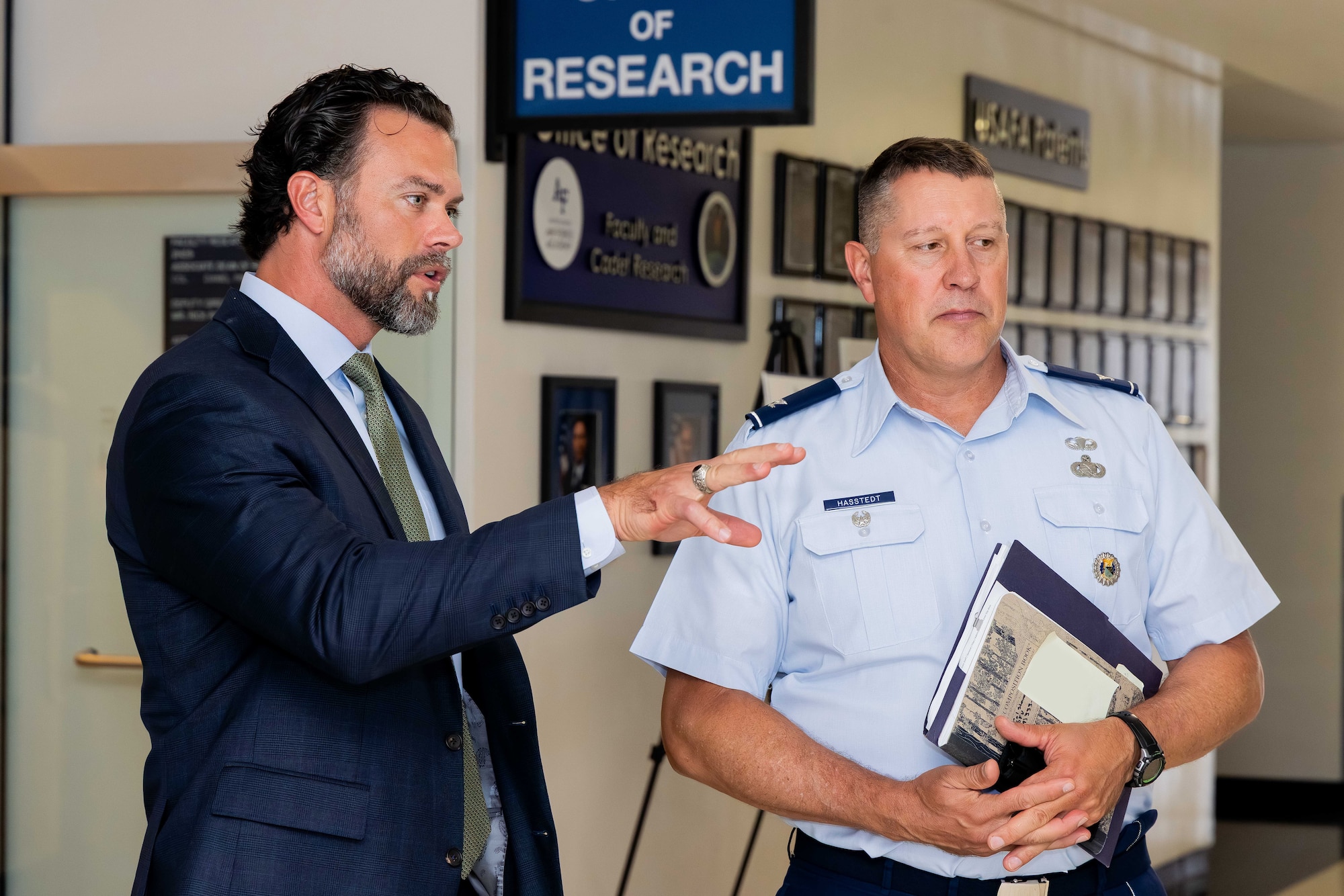Undersecretary of the Air Force Matthew Lohmeier discusses the U.S. Air Force Academy’s academic curriculum with Col. Steven Hasstedt, Acting Dean of the Faculty, at the U.S. Air Force Academy, Colo., Aug. 19, 2025.