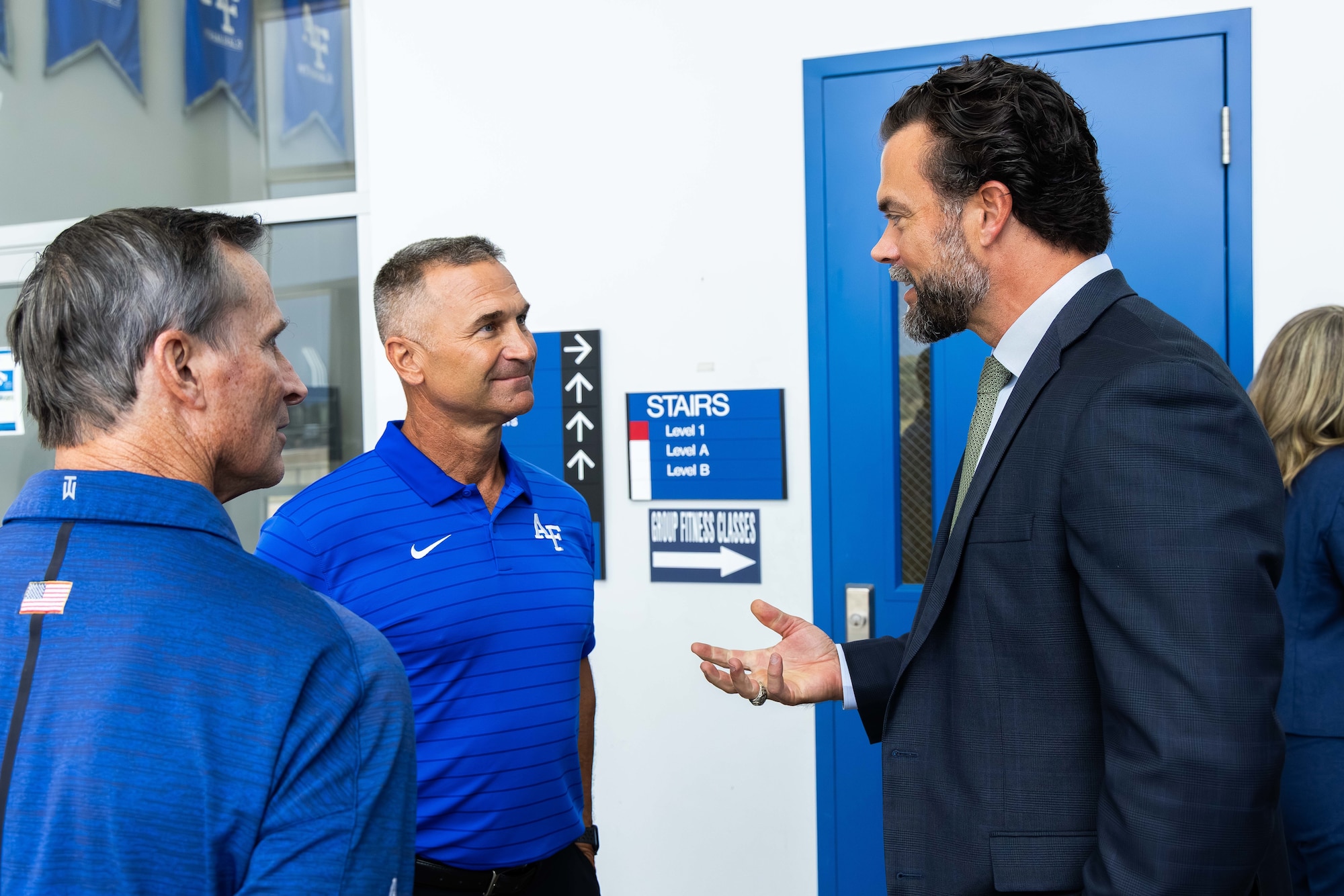 Undersecretary of the Air Force Matthew Lohmeier, right, speaks to U.S. Air Force Academy head baseball coach, left, at the U.S. Air Force Academy, Colorado on August 19, 2025.