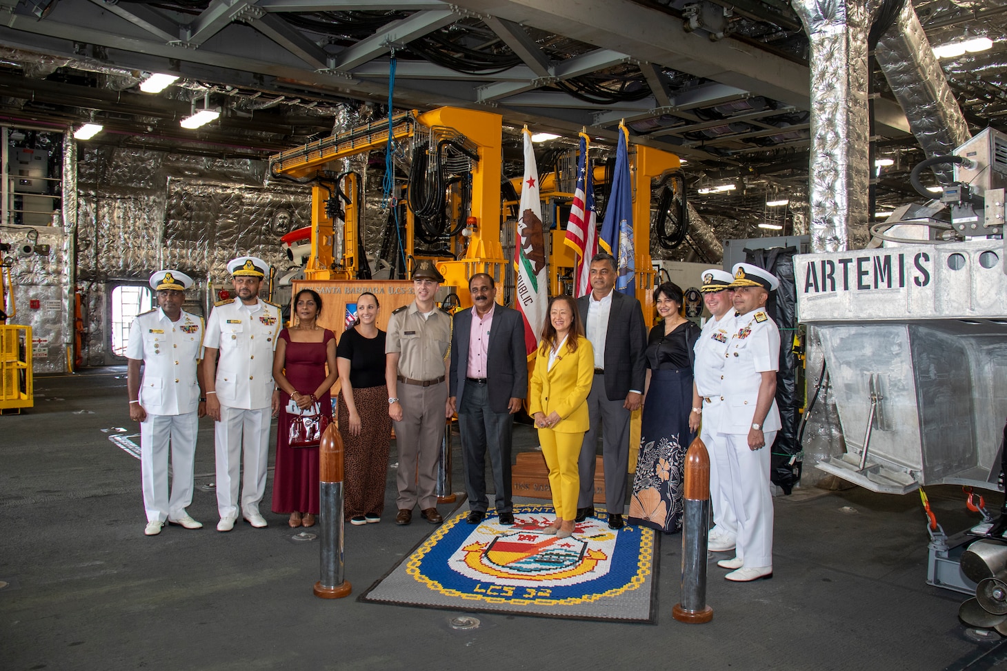 Cmdr. Adam Ochs, commanding officer of the Independence-variant littoral combat ship USS Santa Barbara (LCS 32) poses for a photo with senior Sri Lankan defense officials in the mission bay during a tour, Aug. 16, 2025. Santa Barbara conducted a port visit to Colombo, Sri Lanka while on a rotational deployment to the U.S. 7th Fleet area of operations to strengthen partnerships in the South Asia region. (U.S. Navy photo by Electronics Technician 2nd Class Alexander Klee)