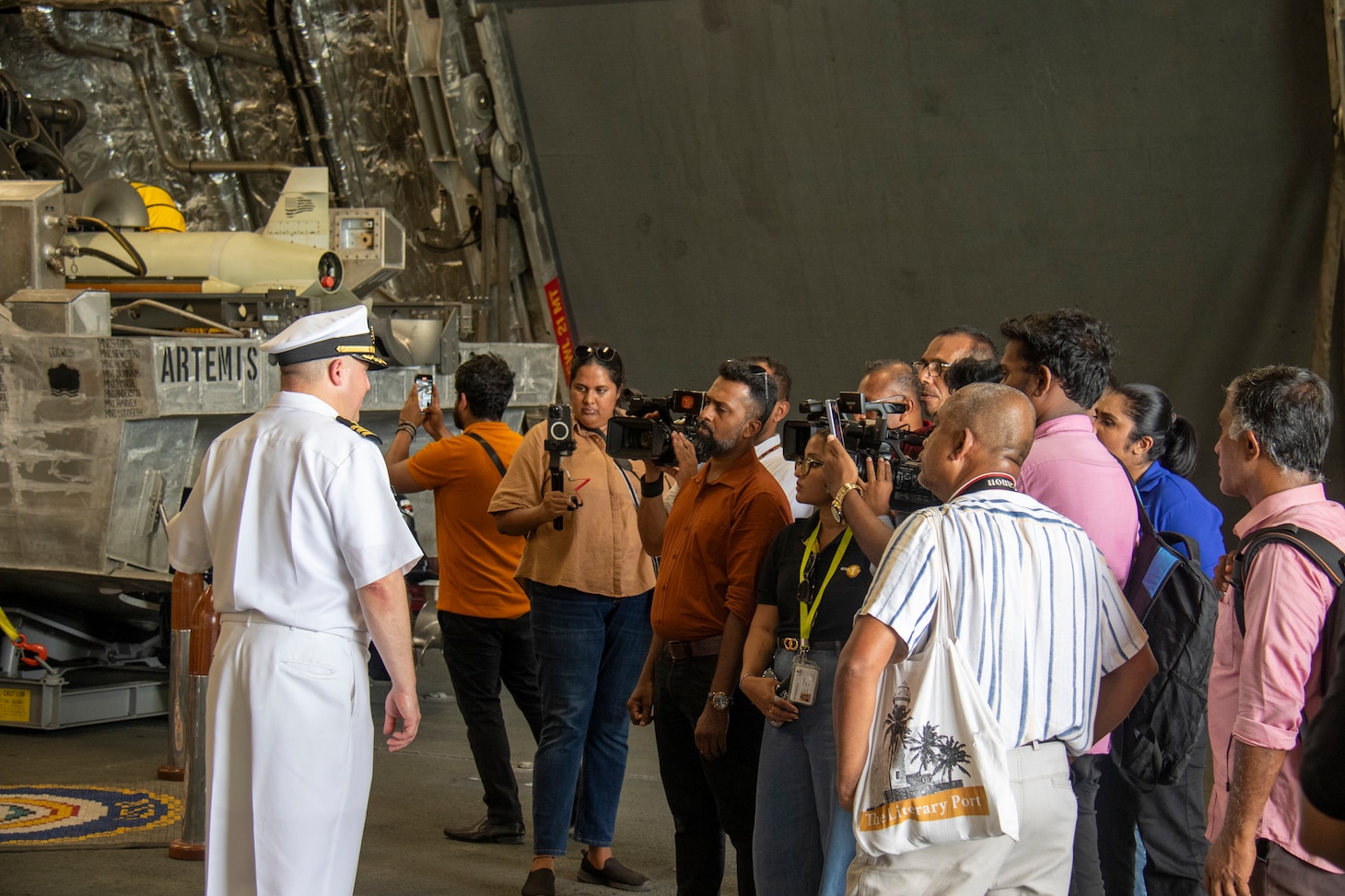 Cmdr. Adam Ochs, commanding officer of the Independence-variant littoral combat ship USS Santa Barbara (LCS 32), speaks with members of local and regional press in the mission bay during a tour, Aug. 16, 2025. Santa Barbara conducted a port visit to Colombo, Sri Lanka while on a rotational deployment to the U.S. 7th Fleet area of operations to strengthen partnerships in the South Asia region. (U.S. Navy photo by Electronics Technician 2nd Class Alexander Klee)