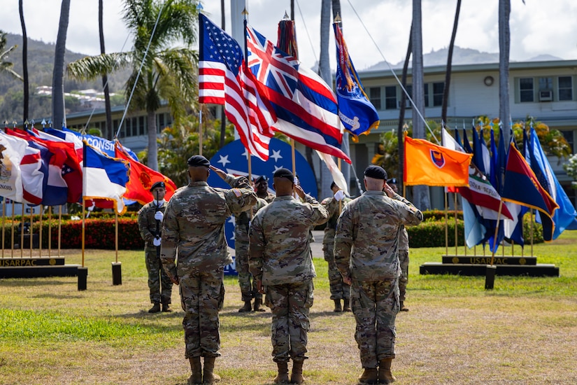 (From left to right) U.S. Army Brig. Gen. George C. Turner, U.S. Army Pacific, Gen. Ronald P. Clark, and Brig. Gen. Thomas E. Burke, salute the flag during the national anthem, Aug. 22, 2025, at Palm Circle on Fort Shafter, Hawaii. The generals were participating in the USARPAC "Flying V" ceremony, which was held to welcome Turner and Burke to the command. (U.S. Army photo by Sgt. Jared Simmons)