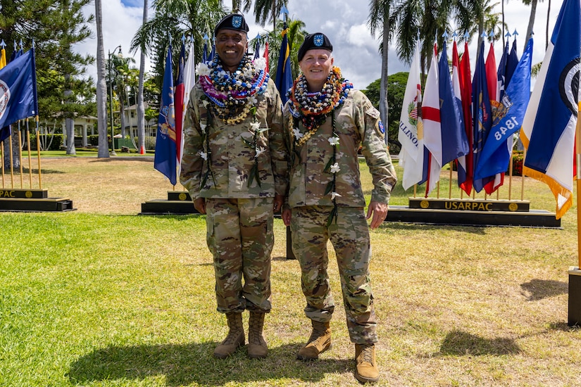 U.S. Army Brig. Gen. George C. Turner (left), the U.S. Army Pacific (USARPAC) G3 Officer in Charge, and Brig. Gen. Thomas E. Burke, the USARPAC Chief of Staff, stand together after a "Flying V" ceremony, Aug. 22, 2025, at Fort Shafter, Hawaii. The ceremony was held to honor incoming members of the USARPAC team and welcome the incoming G3 and Chief of Staff. (U.S. Army photo by Sgt. Ian Burns)