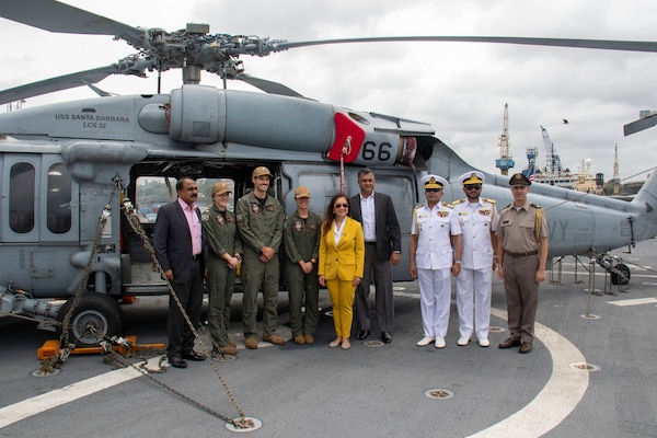 U.S. Navy Sailors pose for a photo with senior Sri Lankan defense officials on the flight deck of the Independence-variant littoral combat ship USS Santa Barbara (LCS 32) during a tour, Aug. 16, 2025. The Santa Barbara conducted a port visit to Colombo, Sri Lanka, while on a rotational deployment to the U.S. 7th Fleet area of operations to strengthen partnerships in the South Asia region. (U.S. Navy photo by Electronics Technician 2nd Class Alexander Klee)