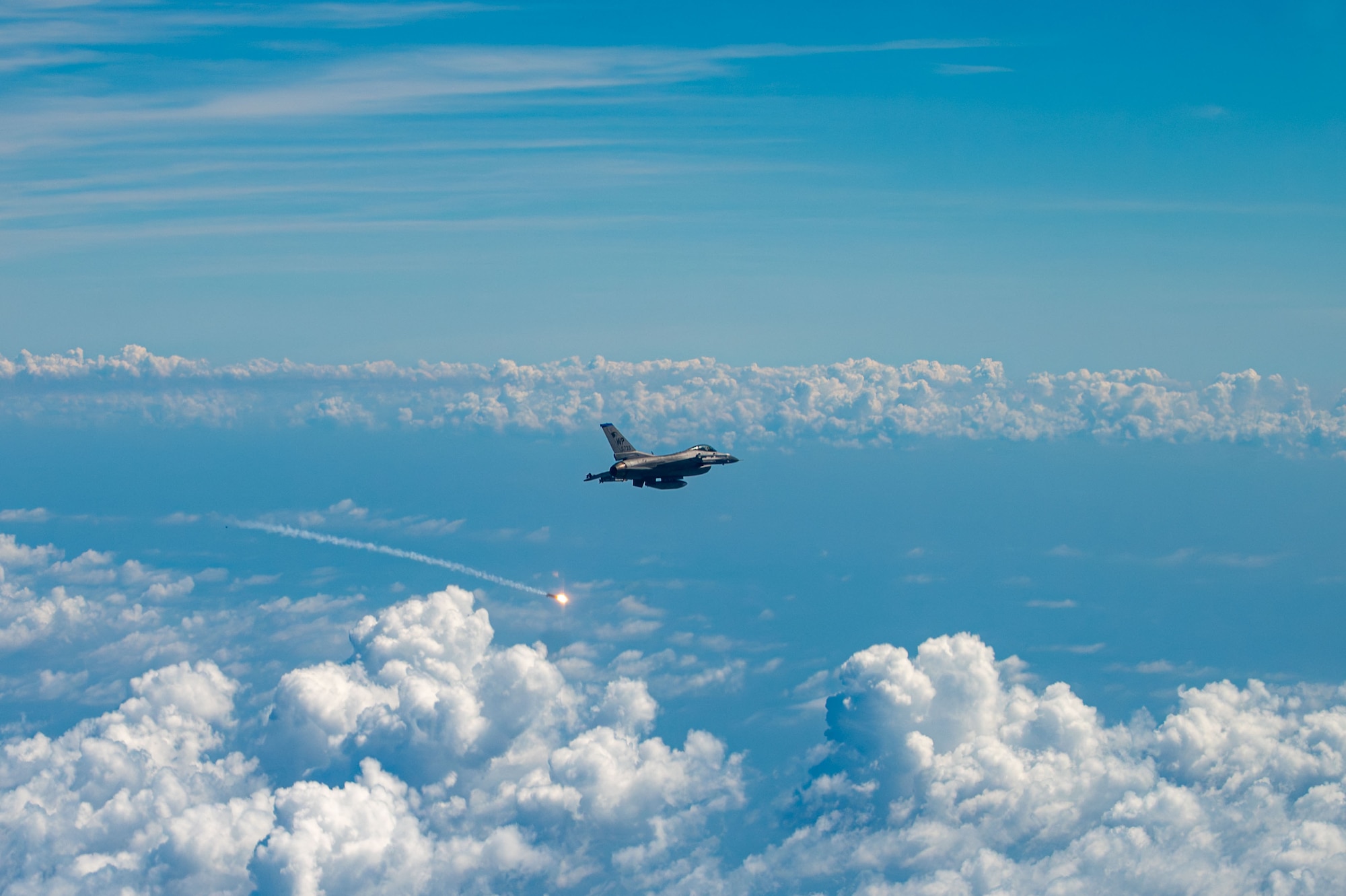 One jet flying shoots a flare