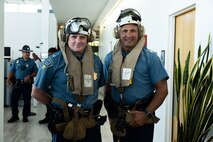 Geoffrey Noble, a Massachusetts State Police colonel and Marc Lavoi, a Massachusetts State Police lieutenant colonel, pose for a photo at the Signature Aviation Boston Logan International Airport in Boston, Mass., Aug. 22, 2025. The Marine Corps is celebrating its 250th birthday by including activations across the city featuring aircraft, equipment, recruiting opportunities, and public engagements. (U.S. Marine Corps photo by Lance Cpl. Alondra Y. Lopez Gonzalez)