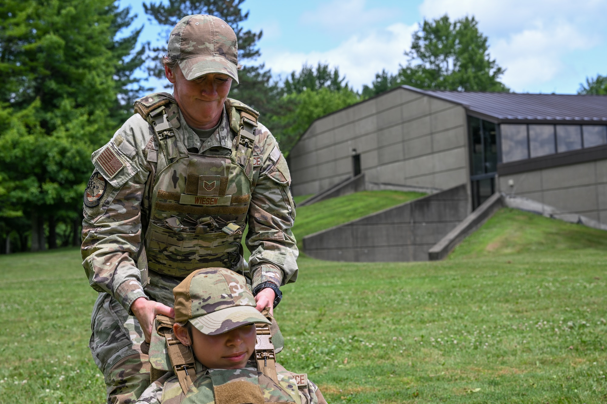 Staff Sgt. Danielle Wiesen, a member of the 910th Aircraft Maintenance Squadron and Integrated Defense Leadership Course student, practices a carry technique during tactical combat casualty care training at Youngstown Air Reserve Station, Ohio, July 17, 2025.
