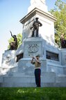 U.S. Marine Corps Cpl. Kristofer Cloward, a Marine musician from Special Purpose Marine Air Ground Task Force-250, performs “Taps” during a wreath laying ceremony at the Soldiers and Sailors Monument during Marine Week Boston, Aug. 22, 2025. The Marines held the ceremony for all Marines who paid the ultimate sacrifice in the Vietnam War. Marines stationed across the globe commemorate the 250th anniversary of the Marine Corps, honoring a distinguished legacy of service, sacrifice, and unwavering fidelity to both the nation and fellow Marines. (U.S. Marine Corps photo by Cpl. Vincent Needham)