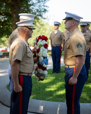 U.S. Marines with Special Purpose Marine Air-Ground Task Force-250 present the wreath during a wreath laying ceremony at the Soldiers and Sailors Monument during Marine Week Boston, Aug. 22, 2025. The Marines held the ceremony for all Marines who paid the ultimate sacrifice in the Vietnam War. Marines stationed across the globe commemorate the 250th anniversary of the Marine Corps, honoring a distinguished legacy of service, sacrifice, and unwavering fidelity to both the nation and fellow Marines. (U.S. Marine Corps photo by Cpl. Vincent Needham)