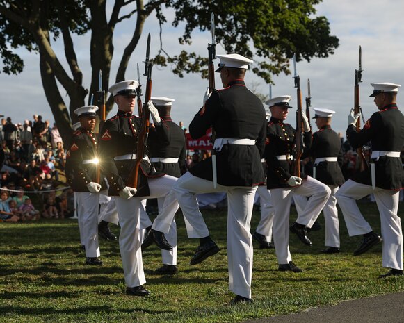 The United States Marine Corps Silent Drill Platoon, representing Marine Barracks Washington, performs during the Marblehead welcoming ceremony for Marine Week Boston in Marblehead, Massachusetts, Aug. 21, 2025. The year 2025 marks the 250th anniversary of the United States Marine Corps, a milestone that highlights the legacy, transformation and enduring spirit of the Corps since 1775. Throughout the year, Marines across the globe will commemorate this anniversary by honoring the service and sacrifice of those who served before them and by remaining faithful to the motto Semper Fidelis. (U.S. Marine Corps photo by Lance Cpl. Brynn L. Bouchard)