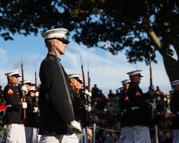U.S. Marine Corps Capt. Ford Higgins, platoon commander of the United States Marine Corps Silent Drill Platoon, Marine Barracks Washington, marches the platoon during a drill sequence at Marine Week Boston in Marblehead, Massachusetts, Aug. 21, 2025. The year 2025 marks the 250th anniversary of the United States Marine Corps, a milestone that highlights the legacy, transformation and enduring spirit of the Corps since 1775. Throughout the year, Marines across the globe will commemorate this anniversary by honoring the service and sacrifice of those who served before them and by remaining faithful to the motto Semper Fidelis. (U.S. Marine Corps photo by Lance Cpl. Brynn L. Bouchard)
