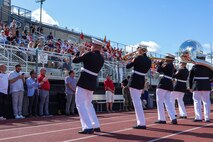 U.S. Marines with the Quantico Marine Band perform for Marines, veterans, poolees and guests in celebration of the Marine Corps’ 250th birthday during Marine Week Boston, Aug. 24, 2025. Marines with Marine Corps Recruiting Command share their traditions with local high schools in honor of the Corps’ 250th birthday. In celebration of 250 years of proud tradition, Marines around the world unite to honor their shared heritage - a legacy defined by honor, courage, and commitment. (U.S. Marine Corps photo by Sgt. Aidan Hekker)