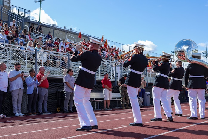 U.S. Marines with the Quantico Marine Band perform for Marines, veterans, poolees and guests in celebration of the Marine Corps’ 250th birthday during Marine Week Boston, Aug. 24, 2025. Marines with Marine Corps Recruiting Command share their traditions with local high schools in honor of the Corps’ 250th birthday. In celebration of 250 years of proud tradition, Marines around the world unite to honor their shared heritage - a legacy defined by honor, courage, and commitment. (U.S. Marine Corps photo by Sgt. Aidan Hekker)