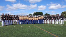 U.S. Marines with the United States Marine Corps Silent Drill Platoon and members of the Lynn English High School Junior Reserve Officer Training Corps drill team pose for a photo during Marine Week Boston, Aug. 24, 2025. Marines with Marine Corps Recruiting Command share their traditions with local high schools in honor of the Corps’ 250th birthday. In celebration of 250 years of proud tradition, Marines around the world unite to honor their shared heritage - a legacy defined by honor, courage, and commitment. (U.S. Marine Corps photo by Sgt. Aidan Hekker)