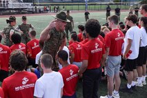 U.S. Marine Corps Staff Sgt. Ean Effert, a drill instructor Golf Company, 2nd Recruit Training Battalion, Marine Corps Recruit Depot Parris Island, motivates poolees with Recruiting Station Boston during Marine Week Boston, Aug. 24, 2025. Pool Functions are held to build camaraderie while preparing future Marines for the mental and physical rigors of recruit training. Marines stationed across the globe commemorate the 250th anniversary of the Marine Corps, honoring a distinguished legacy of service, sacrifice, and unwavering fidelity to both the nation and fellow Marines. (U.S. Marine Corps photo by Sgt. Aidan Hekker)