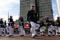U.S. Marines with the United States Marine Corps Silent Drill Platoon, Marine Barracks Washington, perform in a commemoration ceremony during Marine Week Boston at the Boston City Hall Plaza, Aug. 24, 2025. Marines stationed across the globe commemorate the 250th anniversary of the Marine Corps, honoring a distinguished legacy of service, sacrifice, and unwavering fidelity to both the nation and fellow Marines. (U.S. Marine Corps photo by Lance Cpl. Orlanys Diaz Figueroa)