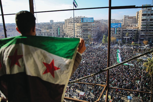 Large crowd converges into Saadallah al-Jabiri Square in Aleppo, Syria, on December 13, 2024, to mark overthrow of Syrian regime of Bashar
al-Asad by opposition forces headed by Hayat Tahrir al-Sham