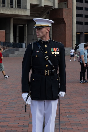 U.S. Marine Corps Capt. Ford Higgins, an infantry platoon commander with the United States Marine Corps Silent Drill Platoon, Marine Barracks Washington, performs at a commemoration ceremony during Marine Week Boston at the Boston City Hall Plaza, Aug. 24, 2025. Marines stationed across the globe commemorate the 250th anniversary of the Marine Corps, honoring a distinguished legacy of service, sacrifice, and unwavering fidelity to both the nation and fellow Marines. (U.S. Marine Corps photo by Lance Cpl. Orlanys Diaz Figueroa)