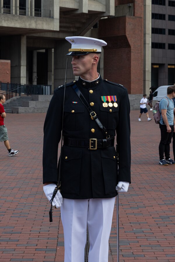 U.S. Marine Corps Capt. Ford Higgins, an infantry platoon commander with the United States Marine Corps Silent Drill Platoon, Marine Barracks Washington, performs at a commemoration ceremony during Marine Week Boston at the Boston City Hall Plaza, Aug. 24, 2025. Marines stationed across the globe commemorate the 250th anniversary of the Marine Corps, honoring a distinguished legacy of service, sacrifice, and unwavering fidelity to both the nation and fellow Marines. (U.S. Marine Corps photo by Lance Cpl. Orlanys Diaz Figueroa)