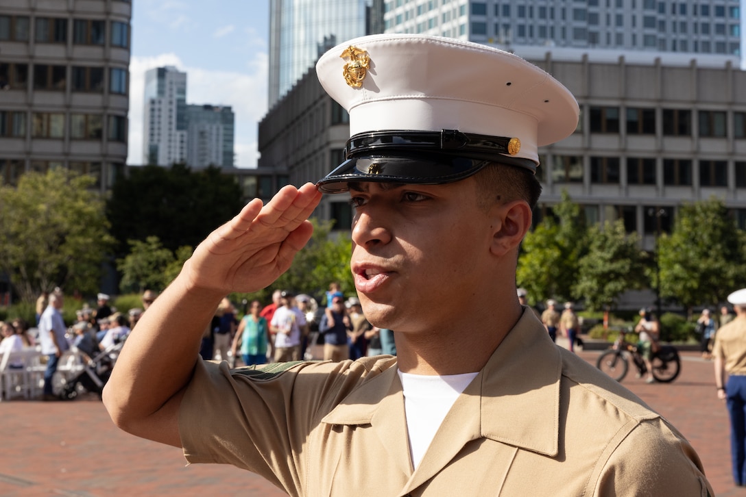 U.S. Marine Corps Sgt. Felype Limas, a network administrator assigned to Special Purpose Marine Air-Ground Task Force-250, participates in a commemoration ceremony during Marine Week Boston at the Boston City Hall Plaza, Aug. 24, 2025. Marines stationed across the globe commemorate the 250th anniversary of the Marine Corps, honoring a distinguished legacy of service, sacrifice, and unwavering fidelity to both the nation and fellow Marines. (U.S. Marine Corps photo by Lance Cpl. Orlanys Diaz Figueroa)