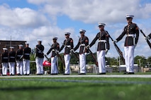 U.S. Marines with the United States Marine Corps Silent Drill Platoon perform for Marines, veterans, poolees and guests during Marine Week Boston, Aug. 24, 2025. Marines with Marine Corps Recruiting Command share their traditions with local high schools in honor of the Corps’ 250th birthday. In celebration of 250 years of proud tradition, Marines around the world unite to honor their shared heritage - a legacy defined by honor, courage, and commitment. (U.S. Marine Corps photo by Sgt. Aidan Hekker)