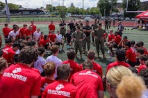 U.S. Marine Corps drill instructors with Marine Corps Recruit Depot Parris Island, give remarks to poolees with Recruiting Station Boston during Marine Week Boston, Aug. 24, 2025. Pool Functions are held to build camaraderie while preparing future Marines for the mental and physical rigors of recruit training. Marines stationed across the globe commemorate the 250th anniversary of the Marine Corps, honoring a distinguished legacy of service, sacrifice, and unwavering fidelity to both the nation and fellow Marines. (U.S. Marine Corps photo by Sgt. Aidan Hekker)