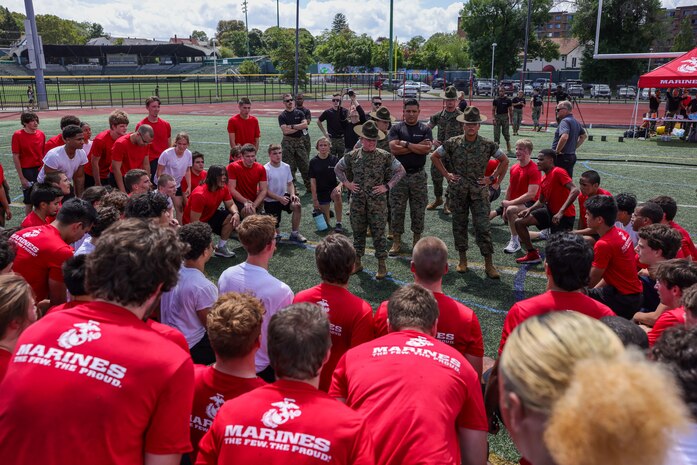 U.S. Marine Corps drill instructors with Marine Corps Recruit Depot Parris Island, give remarks to poolees with Recruiting Station Boston during Marine Week Boston, Aug. 24, 2025. Pool Functions are held to build camaraderie while preparing future Marines for the mental and physical rigors of recruit training. Marines stationed across the globe commemorate the 250th anniversary of the Marine Corps, honoring a distinguished legacy of service, sacrifice, and unwavering fidelity to both the nation and fellow Marines. (U.S. Marine Corps photo by Sgt. Aidan Hekker)