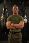 U.S. Marine Corps Staff Sgt. Ean Effert, a native of Greenbay, Wis., and a drill instructor assigned to Special Purpose Marine Air-Ground Task Force-250, poses for a photo during a martial arts collaboration at Broadway Jiu-Jitsu during Marine Week Boston, Aug. 22, 2025. Marines stationed across the globe commemorate the 250th anniversary of the Marine Corps, honoring a distinguished legacy of service, sacrifice, and unwavering fidelity to both the nation and fellow Marines. (U.S. Marine Corps photo by Cpl. Vincent Needham)