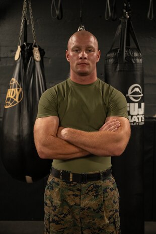 U.S. Marine Corps Staff Sgt. Ean Effert, a native of Greenbay, Wis., and a drill instructor assigned to Special Purpose Marine Air-Ground Task Force-250, poses for a photo during a martial arts collaboration at Broadway Jiu-Jitsu during Marine Week Boston, Aug. 22, 2025. Marines stationed across the globe commemorate the 250th anniversary of the Marine Corps, honoring a distinguished legacy of service, sacrifice, and unwavering fidelity to both the nation and fellow Marines. (U.S. Marine Corps photo by Cpl. Vincent Needham)