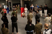 U.S. Marines assigned to Special Purpose Marine Air-Ground Task Force-250 attend a martial arts collaboration at Broadway Jiu-Jitsu during Marine Week Boston, Aug. 22, 2025. Marines stationed across the globe commemorate the 250th anniversary of the Marine Corps, honoring a distinguished legacy of service, sacrifice, and unwavering fidelity to both the nation and fellow Marines. (U.S. Marine Corps photo by Cpl. Vincent Needham)