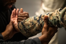 U.S. Marines assigned to Special Purpose Marine Air-Ground Task Force-250 attend a martial arts collaboration at Broadway Jiu-Jitsu during Marine Week Boston, Aug. 22, 2025. Marines stationed across the globe commemorate the 250th anniversary of the Marine Corps, honoring a distinguished legacy of service, sacrifice, and unwavering fidelity to both the nation and fellow Marines. (U.S. Marine Corps photo by Cpl. Vincent Needham)