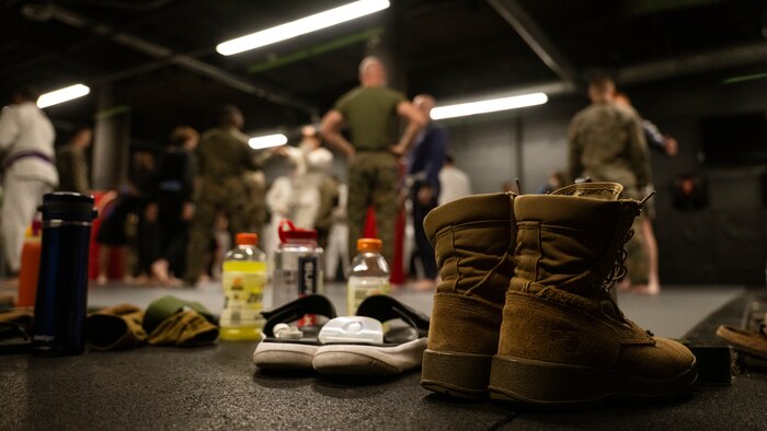 U.S. Marines assigned to Special Purpose Marine Air-Ground Task Force-250 attend a martial arts collaboration at Broadway Jiu-Jitsu during Marine Week Boston, Aug. 22, 2025. Marines stationed across the globe commemorate the 250th anniversary of the Marine Corps, honoring a distinguished legacy of service, sacrifice, and unwavering fidelity to both the nation and fellow Marines. (U.S. Marine Corps photo by Cpl. Vincent Needham)