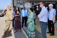 Army Lt. Col. Jon Neal, the commander of Army Field Support Battalion-Germany, (left) briefs professional staff members Alexa Lorick and Kim Segura from the U.S. Senate Committee on Appropriations, Subcommittee on Defense, outside one of the Coleman Army Prepositioned Stocks-2 facilities in Mannheim, Germany, August 13, 2025. (U.S. Army courtesy photo)